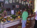 The children love helping pile it up for sale.